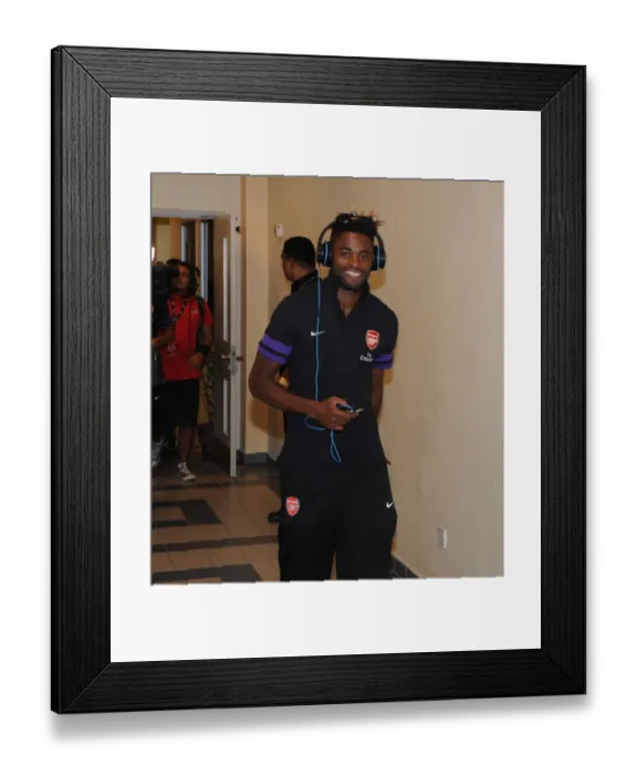Framed Print : Arsenal FC Training in Malaysia: Alex Song Prepares for Malaysia XI Match, 2012 Framed Print : Arsenal FC Training in Malaysia: Alex Song Prepares for Malaysia XI Match, 2012