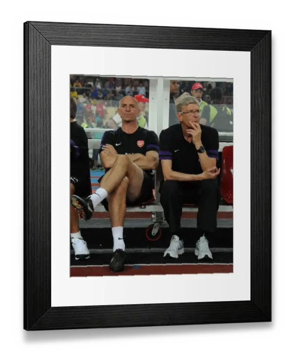 Framed Print : Arsene Wenger and Steve Bould: Arsenal's Pre-Season Duo in Malaysia (2012-13)