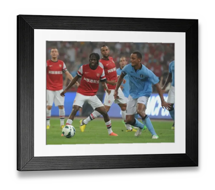 Framed Print : Arsenal vs. Manchester City: Clash at the Birds Nest Stadium (2012)