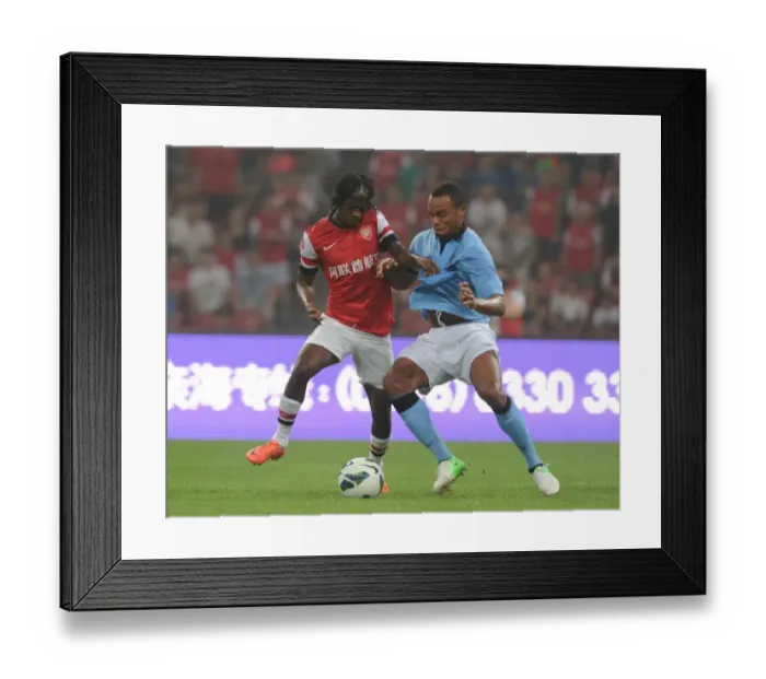 Framed Print : Arsenal vs. Manchester City: Gervinho vs. Kompany - Clash at Beijing's Birds Nest Stadium (2012)