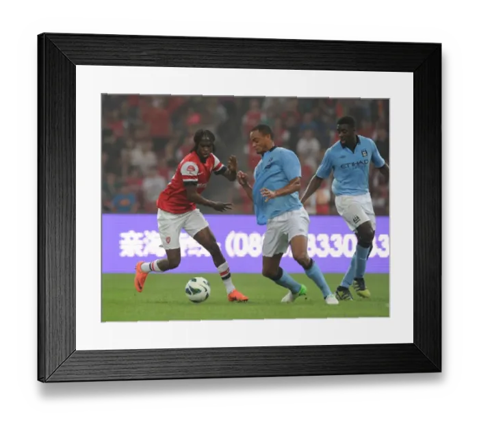 Framed Print : Arsenal vs. Manchester City: Clash in Beijing's Birds Nest Stadium (2012)