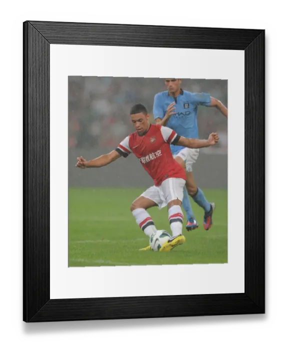 Framed Print : Arsenal's Alex Oxlade-Chamberlain at 2012 Pre-Season Clash vs. Manchester City in Beijing