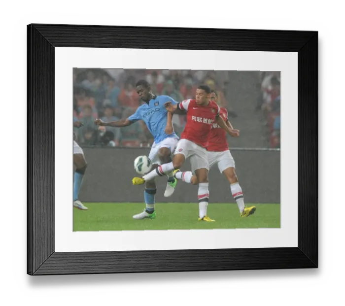 Framed Print : Arsenal FC vs Manchester City: Oxlade-Chamberlain vs Razak Clash in Beijing Pre-Season Friendly Framed Print : Arsenal FC vs Manchester City: Oxlade-Chamberlain vs Razak Clash in Beijing Pre-Season Friendly