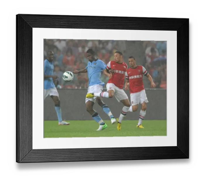 Framed Print : Oxlade-Chamberlain vs Razak: A Pre-Season Battle at the Bird's Nest - Arsenal FC vs Manchester City, Beijing 2012 Framed Print : Oxlade-Chamberlain vs Razak: A Pre-Season Battle at the Bird's Nest - Arsenal FC vs Manchester City, Beijing 2012