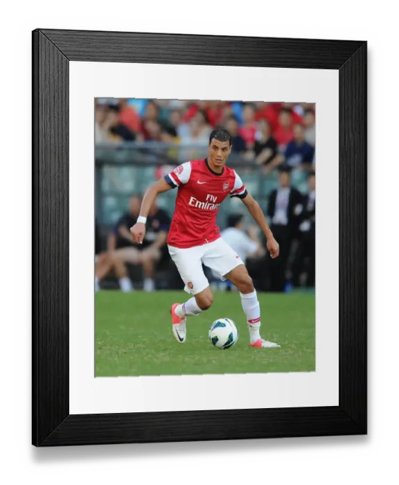 Framed Print : Marouane Chamakh in Action: Kitchee FC vs. Arsenal FC (2012) Framed Print : Marouane Chamakh in Action: Kitchee FC vs. Arsenal FC (2012)