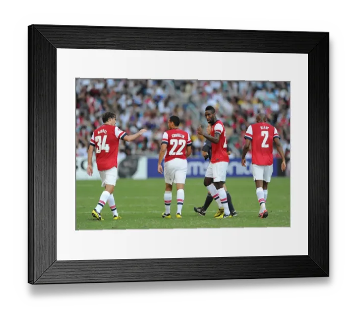 Framed Print : Arsenal FC Players: Ignasi Miquel, Francis Coquelin, Johan Djourou, and Abou Diaby during Kitchee FC Match (2012) Framed Print : Arsenal FC Players: Ignasi Miquel, Francis Coquelin, Johan Djourou, and Abou Diaby during Kitchee FC Match (2012)