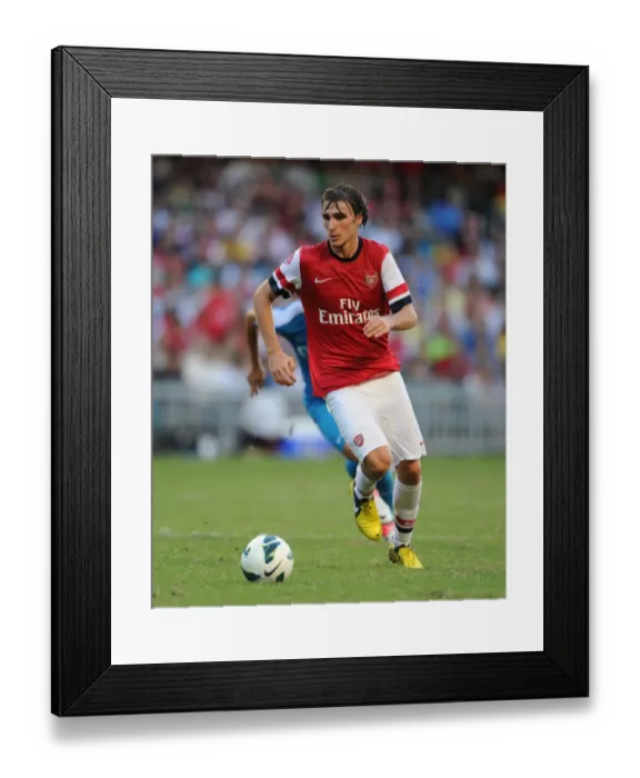 Framed Print : Ignasi Miquel in Action: Kitchee FC vs. Arsenal FC (2012) Framed Print : Ignasi Miquel in Action: Kitchee FC vs. Arsenal FC (2012)