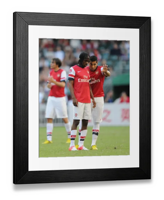 Framed Print : Gervinho and Andre Santos of Arsenal Facing Off Against Kitchee FC in 2012 Pre-Season Friendly Framed Print : Gervinho and Andre Santos of Arsenal Facing Off Against Kitchee FC in 2012 Pre-Season Friendly