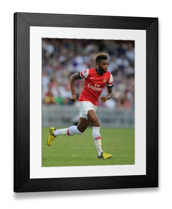 Framed Print : Alex Song in Action: Kitchee FC vs. Arsenal FC, 2012 Framed Print : Alex Song in Action: Kitchee FC vs. Arsenal FC, 2012