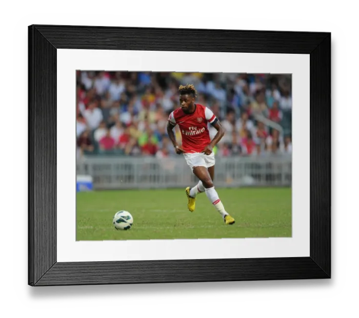 Framed Print : Alex Song: In Action for Arsenal FC Against Kitchee, 2012 Framed Print : Alex Song: In Action for Arsenal FC Against Kitchee, 2012