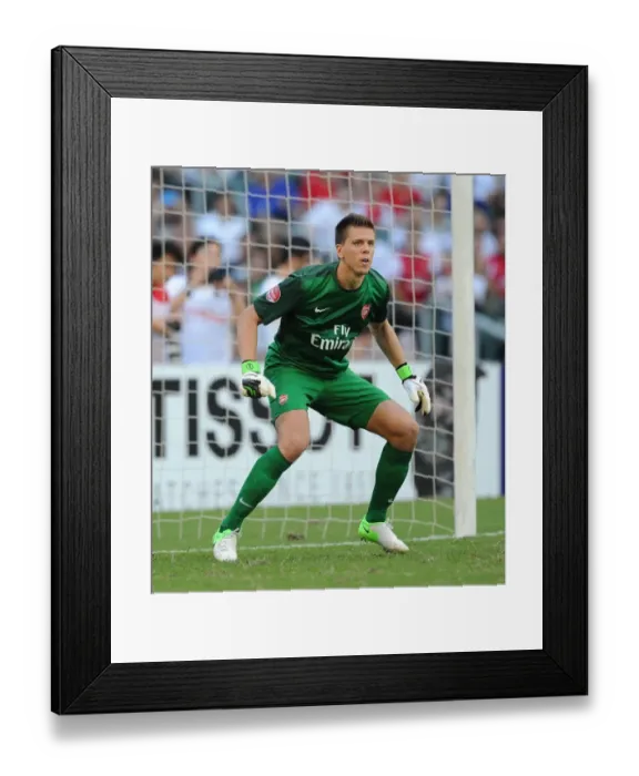 Framed Print : Wojciech Szczesny: Arsenal's Star Goalkeeper in Action at Kitchee FC, 2012