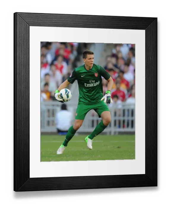 Framed Print : Wojciech Szczesny: Arsenal Goalkeeper in Action against Kitchee (2012) Framed Print : Wojciech Szczesny: Arsenal Goalkeeper in Action against Kitchee (2012)