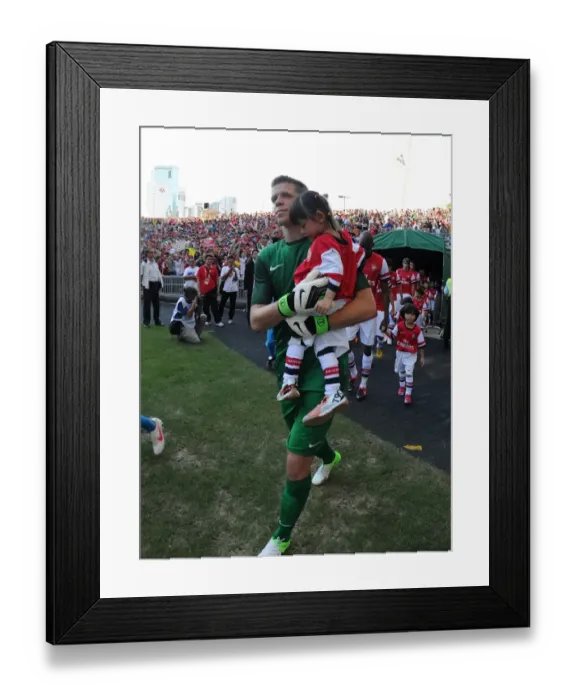 Framed Print : Wojciech Szczesny Escorts Player onto Pitch before Kitchee FC vs Arsenal FC (2012)
