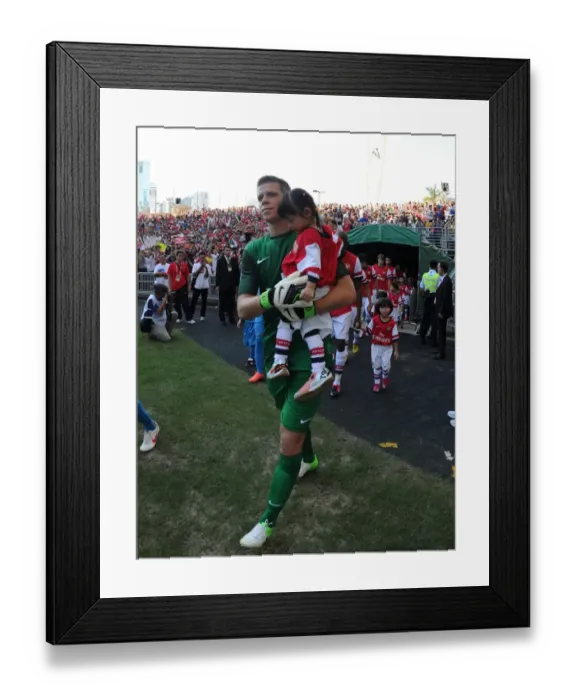 Framed Print : Wojciech Szczesny Escorts Player onto Pitch before Arsenal's Kitchee FC Match (2012-13)