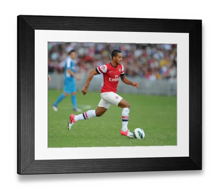 Framed Print : Theo Walcott in Action: Arsenal's Star Forward vs Kitchee FC (2012-13)