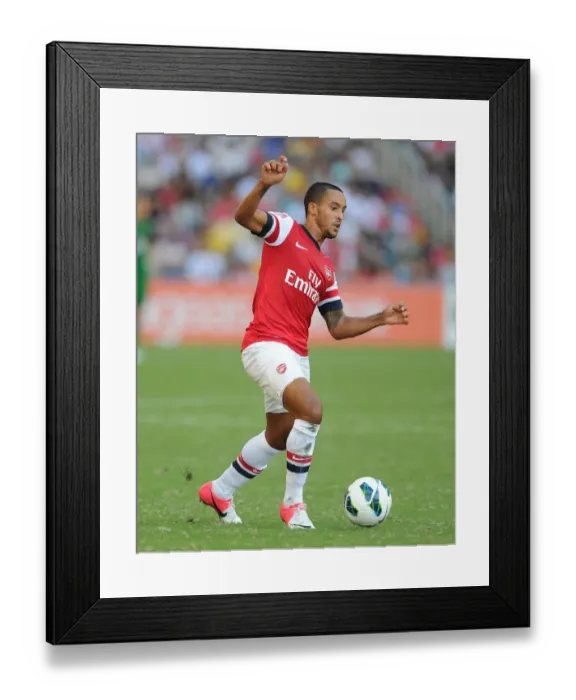 Framed Print : Theo Walcott in Action: Arsenal Forward Shines Against Kitchee FC, 2012 Framed Print : Theo Walcott in Action: Arsenal Forward Shines Against Kitchee FC, 2012