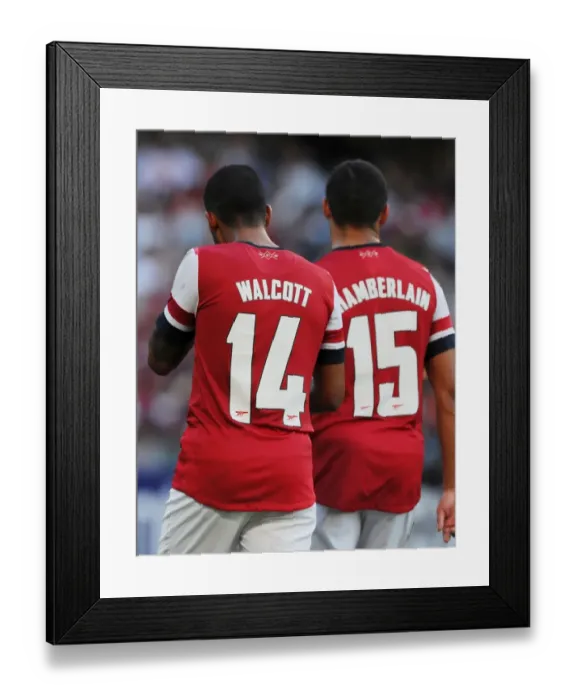 Framed Print : Arsenal's Walcott and Oxlade-Chamberlain Train Together During 2012 Pre-Season Friendly against Kitchee FC Framed Print : Arsenal's Walcott and Oxlade-Chamberlain Train Together During 2012 Pre-Season Friendly against Kitchee FC