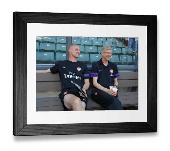Framed Print : Arsene Wenger and Steve Bould Share a Joke Before Kitchee FC vs. Arsenal FC Match (2012) Framed Print : Arsene Wenger and Steve Bould Share a Joke Before Kitchee FC vs. Arsenal FC Match (2012)