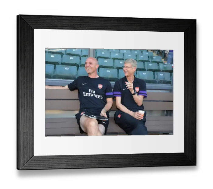 Framed Print : Arsene Wenger and Steve Bould: Sharing a Joke Before Arsenal's Pre-Season Match (2012)