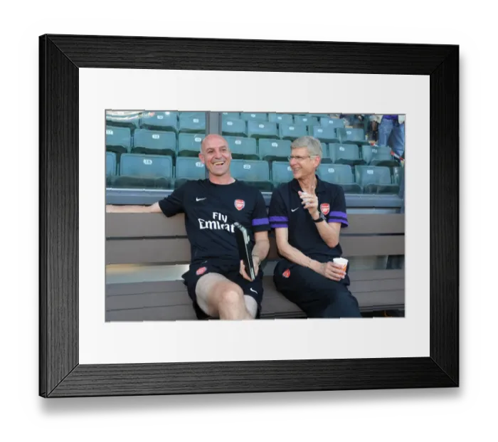 Framed Print : Arsene Wenger and Steve Bould: A Light-Hearted Moment Before Arsenal's Pre-Season Friendly against Kitchee (2012) Framed Print : Arsene Wenger and Steve Bould: A Light-Hearted Moment Before Arsenal's Pre-Season Friendly against Kitchee (2012)