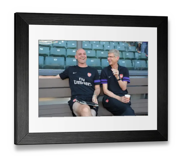 Framed Print : Arsene Wenger and Steve Bould: Sharing a Light-Hearted Moment Before Arsenal's Pre-Season Clash (2012) Framed Print : Arsene Wenger and Steve Bould: Sharing a Light-Hearted Moment Before Arsenal's Pre-Season Clash (2012)