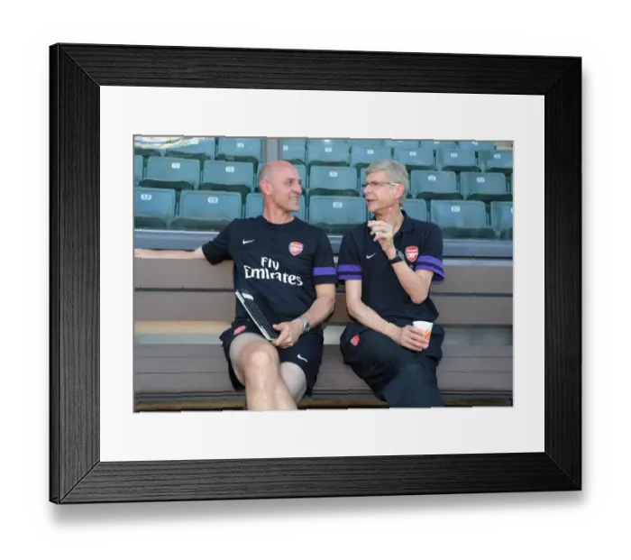 Framed Print : Arsene Wenger and Steve Bould Share a Laugh: Arsenal's Pre-Season Friendly against Kitchee FC (2012) Framed Print : Arsene Wenger and Steve Bould Share a Laugh: Arsenal's Pre-Season Friendly against Kitchee FC (2012)