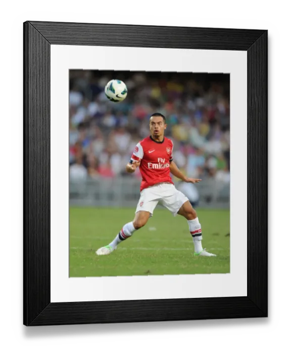 Framed Print : Nico Yennaris in Action: Arsenal's Pre-Season Clash with Kitchee FC (2012)