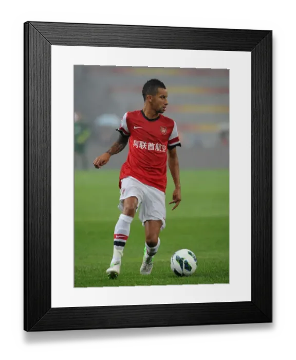 Framed Print : Arsenal's Craig Eastmond Goes Head-to-Head with Manchester City in Beijing Friendly Framed Print : Arsenal's Craig Eastmond Goes Head-to-Head with Manchester City in Beijing Friendly