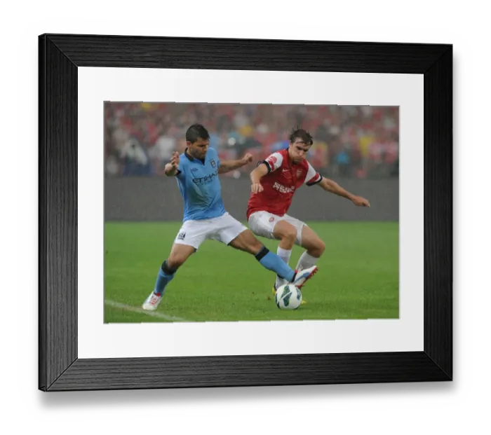 Framed Print : Clash in China: Arsenal's Miquel Tackles Manchester City's Agüero