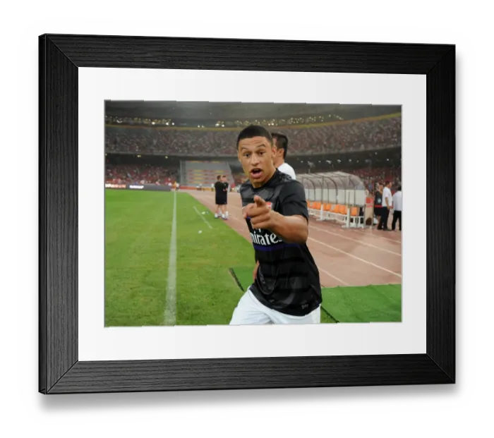 Framed Print : Alex Oxlade-Chamberlain Suffers Defeat with Arsenal against Manchester City in Beijing Pre-Season Friendly