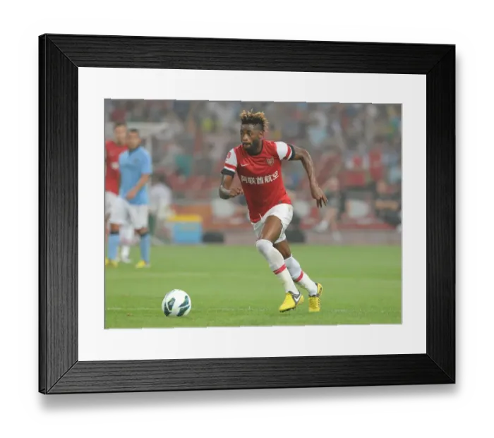 Framed Print : Alex Song Faces Manchester City in Arsenal's Beijing Clash
