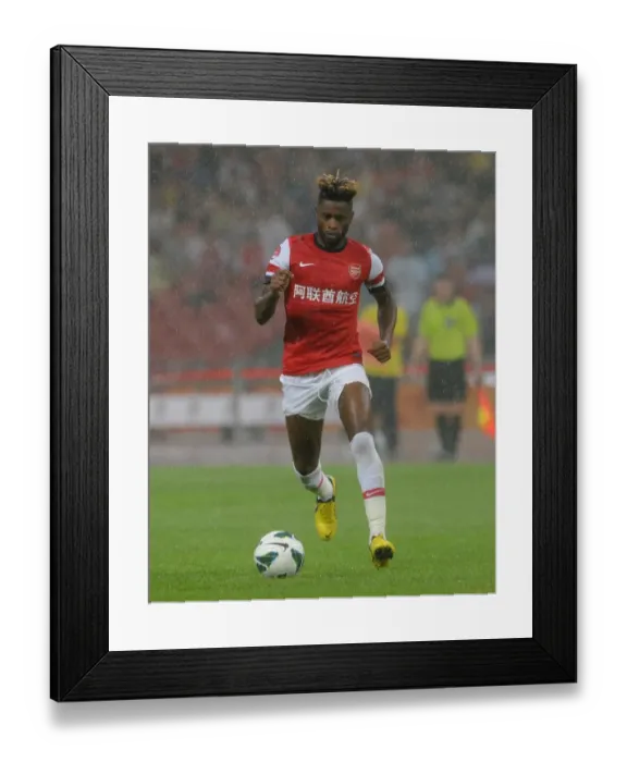 Framed Print : Alex Song in Action: Arsenal vs Manchester City 0-2 Pre-Season Loss at Birds Nest Stadium, Beijing 2012