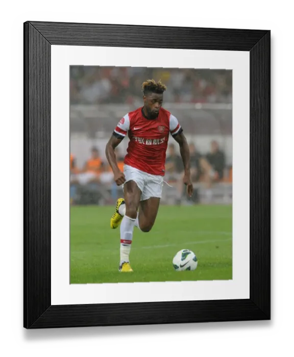 Framed Print : Alex Song in Action: Arsenal vs Manchester City - Pre-Season Defeat at Birds Nest Stadium, Beijing 2012 Framed Print : Alex Song in Action: Arsenal vs Manchester City - Pre-Season Defeat at Birds Nest Stadium, Beijing 2012