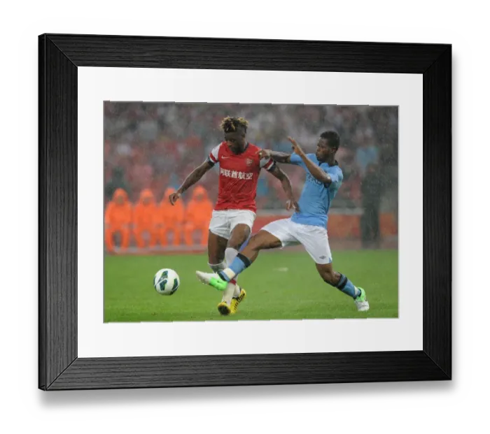 Framed Print : Clash in the Far East: Alex Song vs Razak - Arsenal FC vs Manchester City, Beijing 2012 Framed Print : Clash in the Far East: Alex Song vs Razak - Arsenal FC vs Manchester City, Beijing 2012