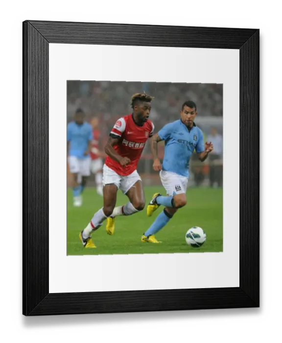 Framed Print : Clash of Titans: Alex Song vs Carlos Tevez - Arsenal FC vs Manchester City, Beijing 2012 Framed Print : Clash of Titans: Alex Song vs Carlos Tevez - Arsenal FC vs Manchester City, Beijing 2012