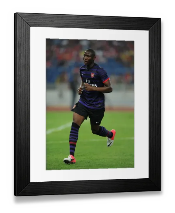 Framed Print : Benik Afobe in Action: Arsenal vs Malaysia XI (2012-13) Framed Print : Benik Afobe in Action: Arsenal vs Malaysia XI (2012-13)