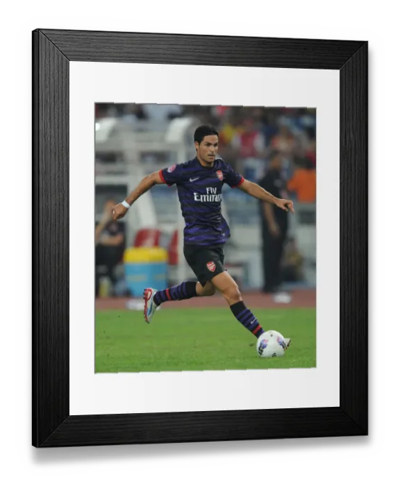 Framed Print : Mikel Arteta Leads Arsenal in 2012 Pre-Season Clash against Malaysia XI Framed Print : Mikel Arteta Leads Arsenal in 2012 Pre-Season Clash against Malaysia XI