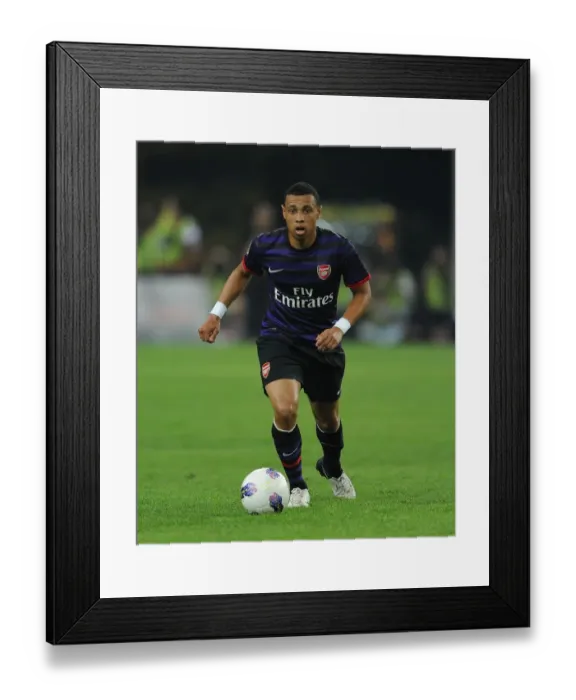 Framed Print : Francis Coquelin: In Action for Arsenal Against Malaysia XI (2012) Framed Print : Francis Coquelin: In Action for Arsenal Against Malaysia XI (2012)