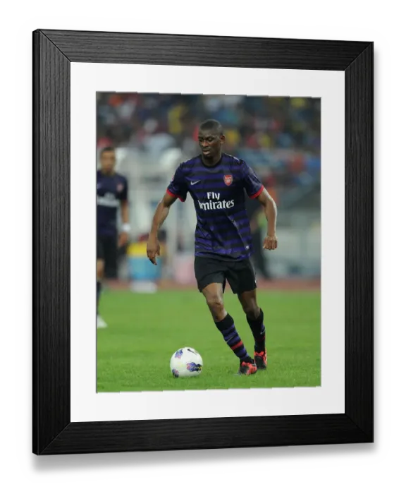 Framed Print : Abou Diaby: In Action for Arsenal Against Malaysia XI, 2012 Framed Print : Abou Diaby: In Action for Arsenal Against Malaysia XI, 2012
