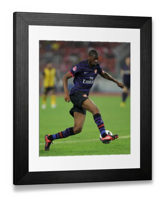Framed Print : Abou Diaby (Arsenal). Malaysia 1: 2 Arsenal. Pre Season Friendly. National Stadium