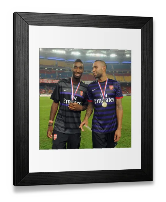 Framed Print : Johan Djourou and Kyle Bartley (Arsenal). Malaysia 1: 2 Arsenal. Pre Season Friendly Framed Print : Johan Djourou and Kyle Bartley (Arsenal). Malaysia 1: 2 Arsenal. Pre Season Friendly