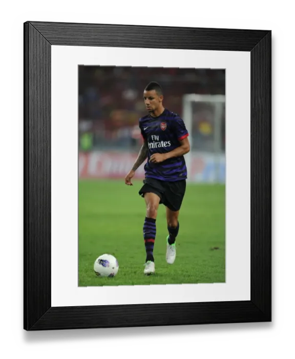 Framed Print : Craig Eastmond in Action: Arsenal vs Malaysia XI, 2012 Framed Print : Craig Eastmond in Action: Arsenal vs Malaysia XI, 2012