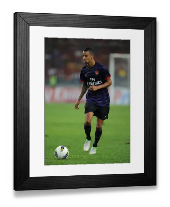 Framed Print : Craig Eastmond in Action: Arsenal vs Malaysia XI (2012)