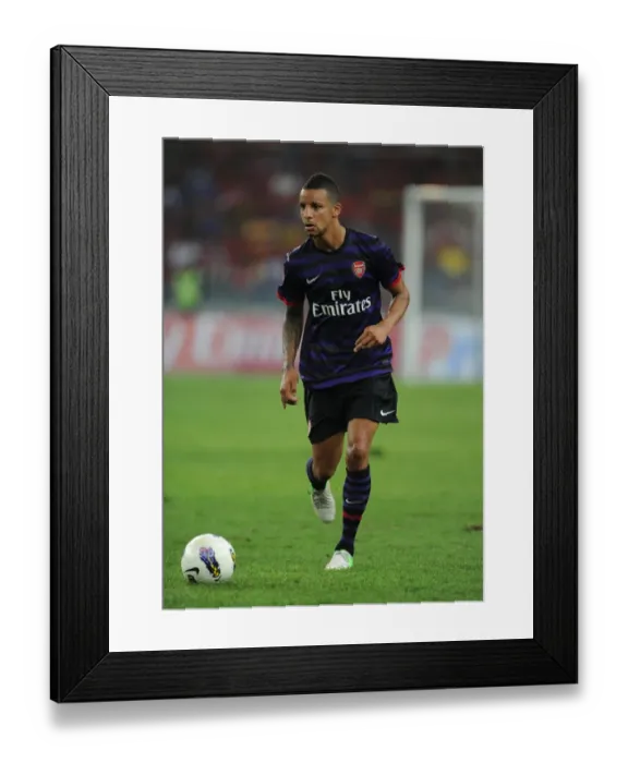 Framed Print : Craig Eastmond in Action: Malaysia XI vs Arsenal (2012-13) Framed Print : Craig Eastmond in Action: Malaysia XI vs Arsenal (2012-13)