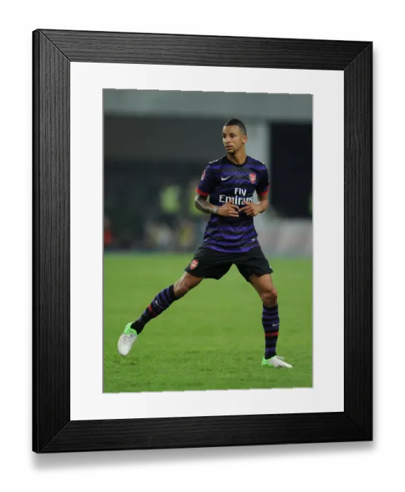 Framed Print : Craig Eastmond in Action: Arsenal vs Malaysia XI (2012)