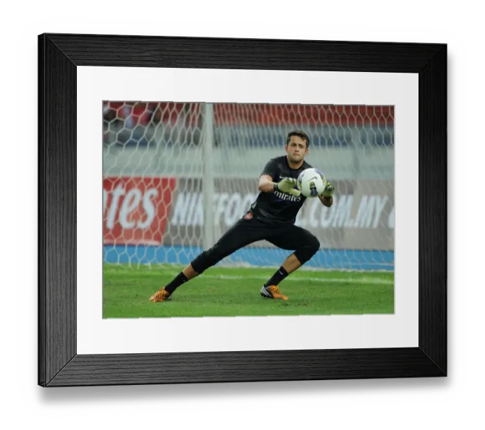 Framed Print : Lukasz Fabianski Gears Up: Arsenal's Pre-Season Training in Malaysia (2012-13) Framed Print : Lukasz Fabianski Gears Up: Arsenal's Pre-Season Training in Malaysia (2012-13)
