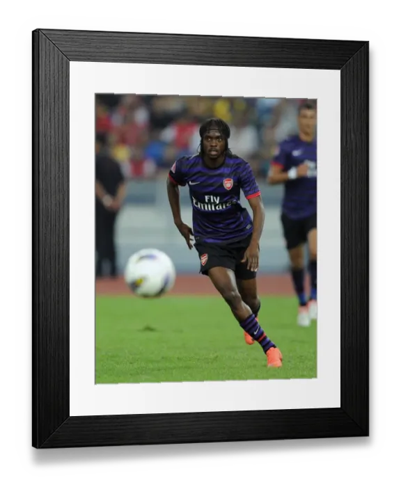 Framed Print : Gervinho in Action: Arsenal vs Malaysia XI (2012) Framed Print : Gervinho in Action: Arsenal vs Malaysia XI (2012)