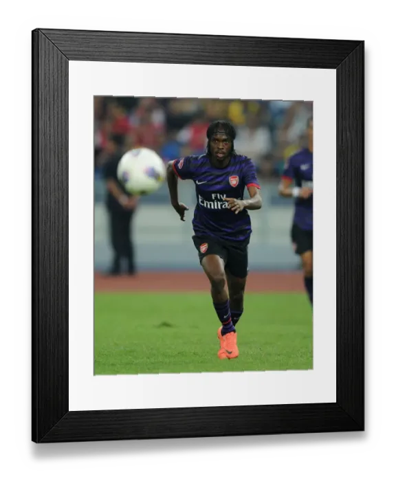 Framed Print : Gervinho in Action: Arsenal vs Malaysia XI, 2012