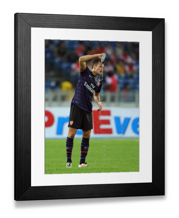Framed Print : Carl Jenkinson in Action: Arsenal vs Malaysia XI (2012-13)
