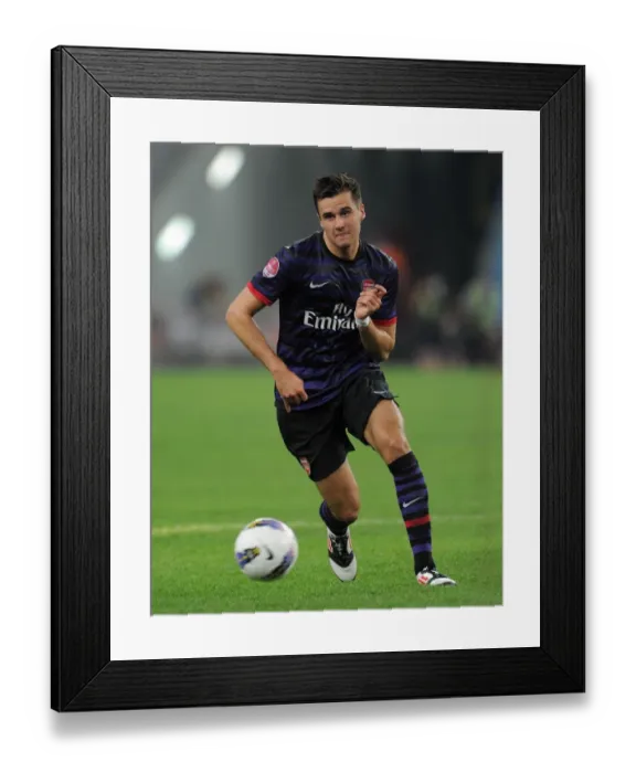 Framed Print : Carl Jenkinson in Action: Arsenal vs Malaysia XI (2012-13) Framed Print : Carl Jenkinson in Action: Arsenal vs Malaysia XI (2012-13)